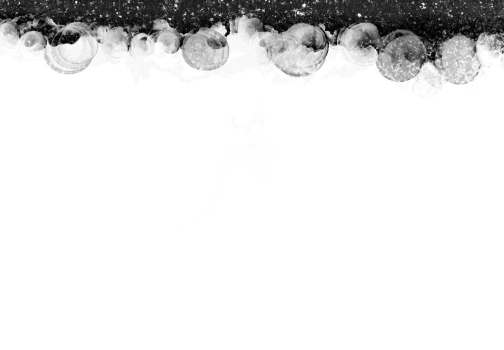 Cloudy black alcohol inks with glittery stars.