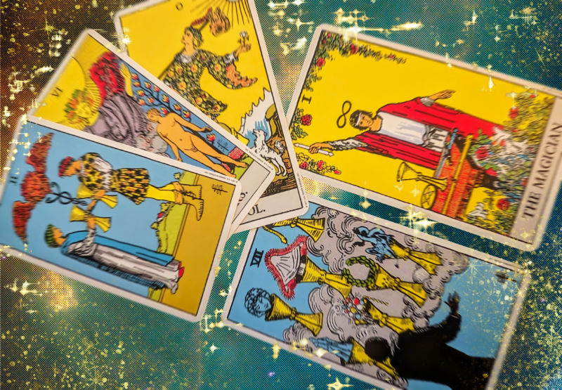 Header image of tarot cards featuring Two of Cups, The Lovers, The Fool, Seven of Cups, and The Magician.