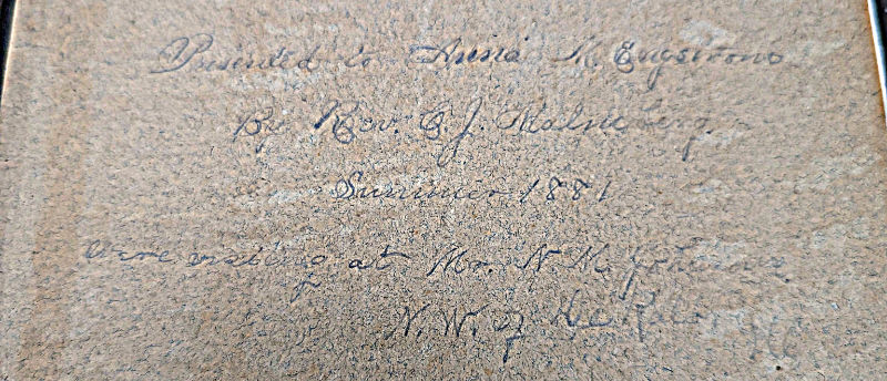 The same inscription, a sharpened to show the handwriting better, though not by much.