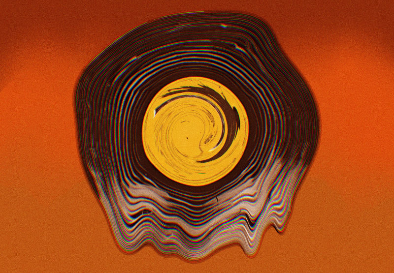 A melted record against an orange and brown background.