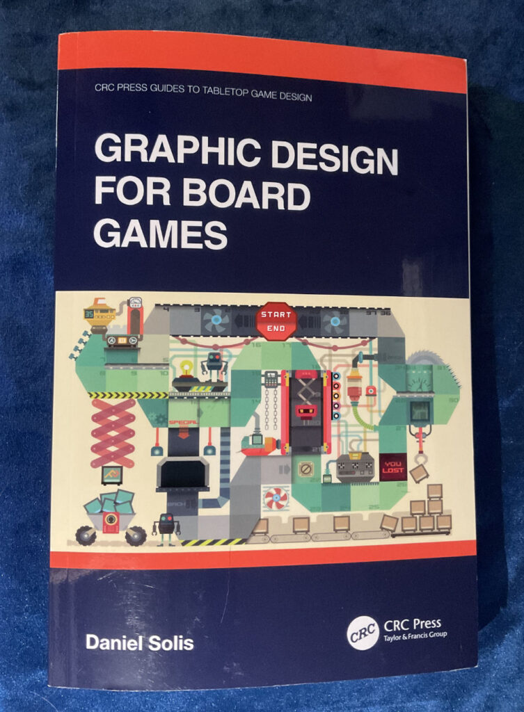 The cover of Graphic Design for Board Games by Daniel Solis.