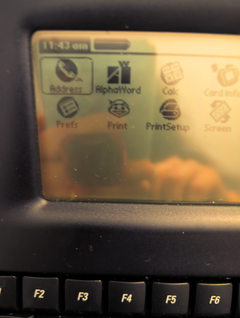 Closeup of the AlphaSmart Dana screen, showing apps.
