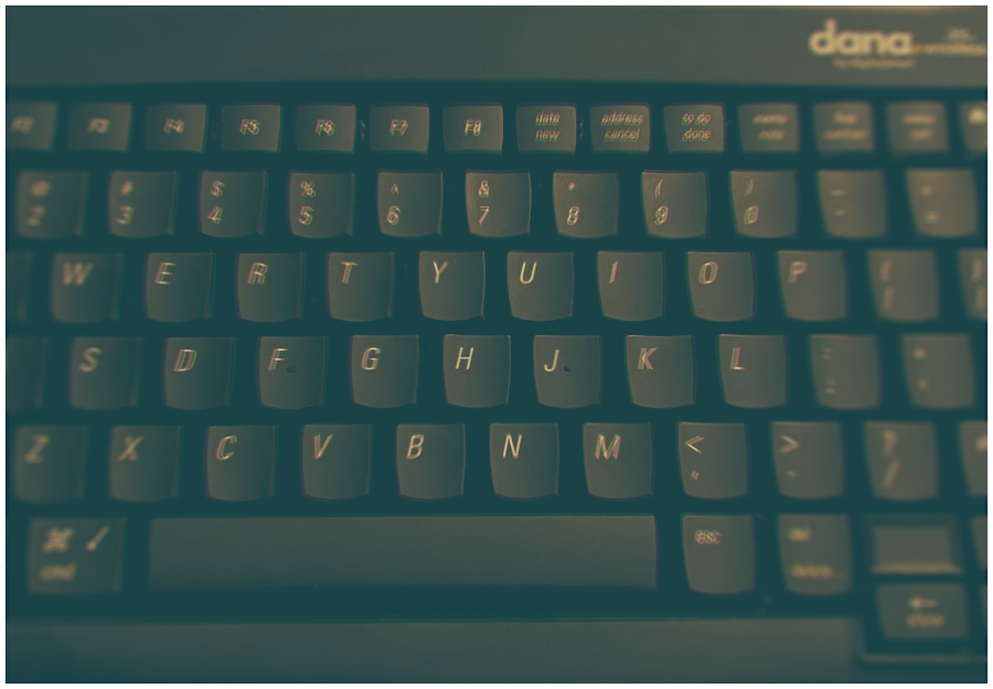 A closeup of the Alphasmart Dana's keys, with dreamy 90s and aberration effects.